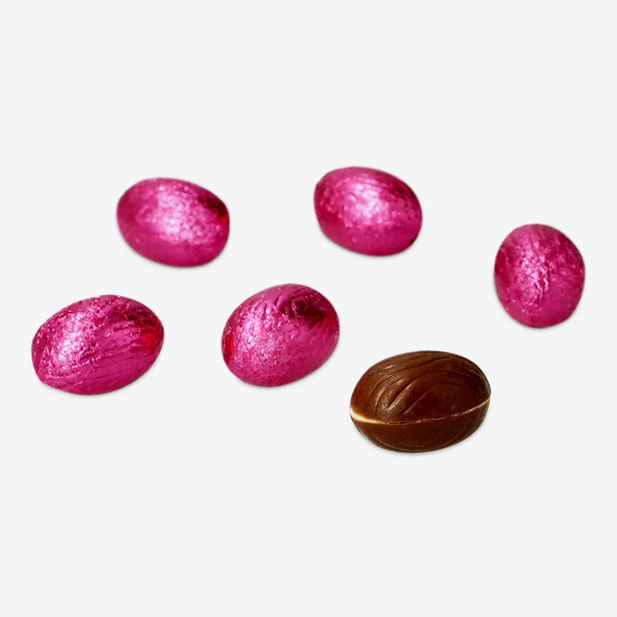 Pink milk chocolate eggs in net with milky cream filling and brownie - Image 3